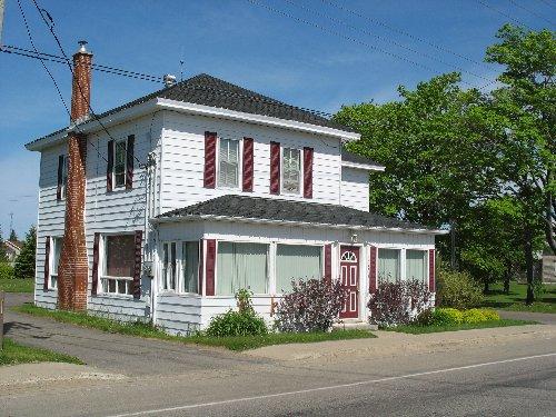 A photo of the house seen from the right side.; Town of Tracadie-Sheila