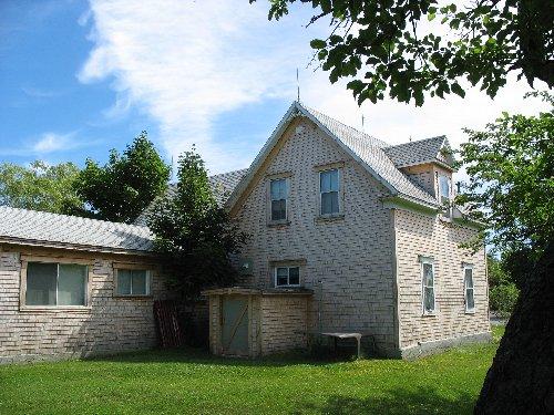 Photo of the rear of the house; Town of Tracadie-Sheila