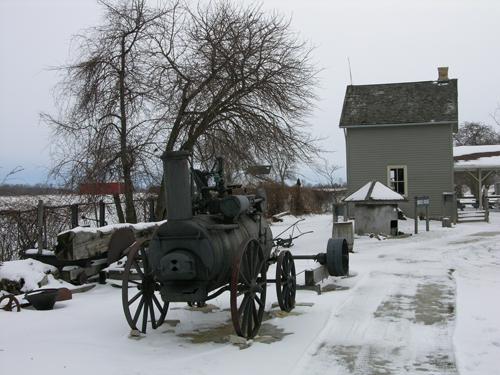 Contextual view from the north showing sawmill and smoke house in the foreground – December 2005; OHT, 2005