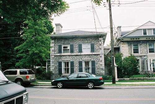 View of the main (north) façade showing attachment to 221 King Street – July 2004; OHT, 2004