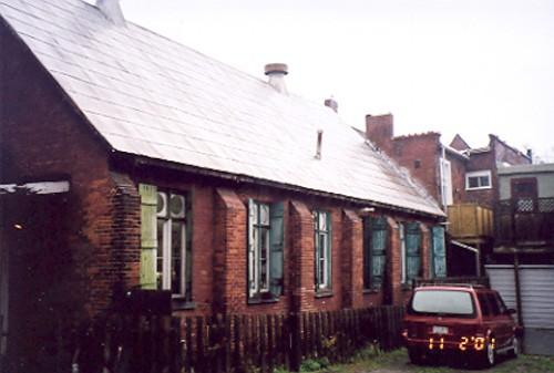 View of the south elevation of the rear hall showing buttresses and windows – November 2001; OHT, 2001