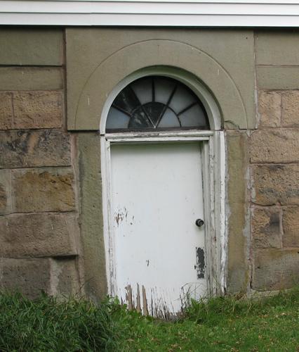 Basement door; City of Dieppe