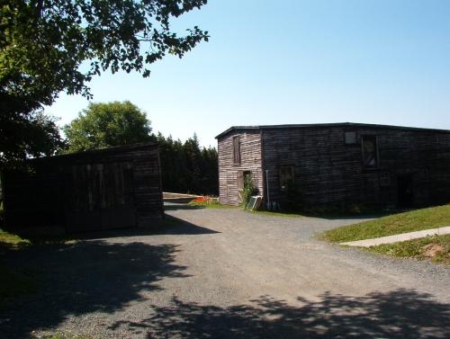 View looking up the driveway, south, and passing between the Carriage House and Barn.  Photo taken July 2004.; Deborah O'Rielly/ HFNL 2007