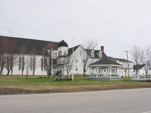 Contextual view showing the presbytery, the church and the picnic grounds; Village of Rogersville