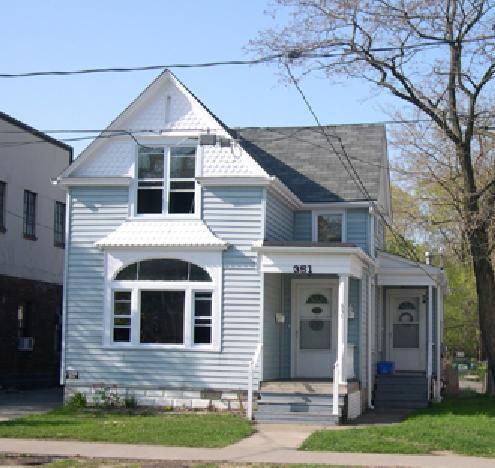 Decorative fish-scale shingles are an important feature of this Queen Anne style cottage.; City of Windsor, Bill Renaud