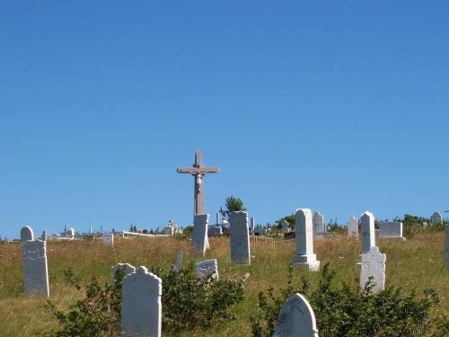 View of cemetery showing various gravemarkers and crucifix.  Photo taken September 2006.; HFNL/ Dale Jarvis 2006