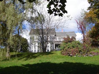 View from Lower Main Street, showing the terraced lawn.; Carleton County Historical Society