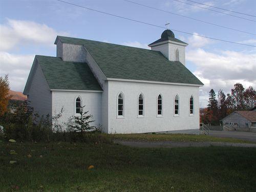 Side view of Saint Joseph's Roman Catholic Church, Marble Mountain, Nova Scotia, 2002.; Inverness County Heritage Advisory Committe, 2002