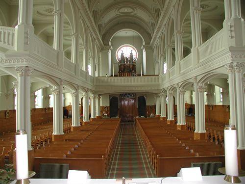 View toward the entrance of the church, Paroisse Saint-Pierre, Chéticamp, NS, 2002.; Inverness County Heritage Advisory Committe, 2002
