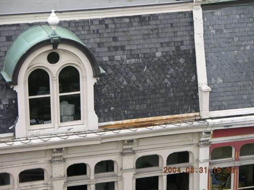 Detail showing fourth level dormer window, inset into mansard slate roof.; OHT, 2004