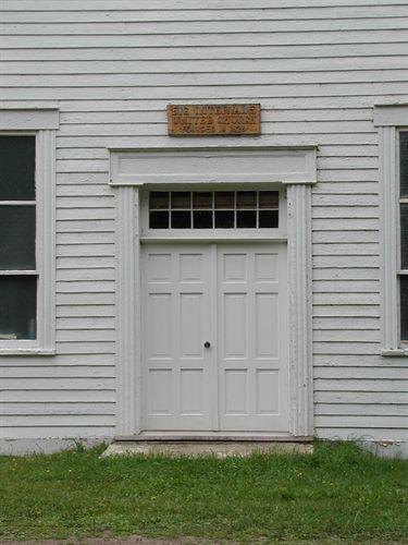 Front door, Big Intervale United Church, Kingross, Nova Scotia, 2002.; Inverness County Heritage Advisory Committe, 2002.