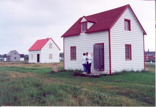 Contextual view of the building showing the McLeod House in between two other HBC houses – c. 1993; OHT, 1993