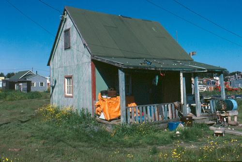 Historic view from the southwest showing the building before restoration – c. 1983; OHT, 1983