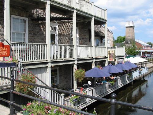 View looking north along the Little Tay River showing the three-tier veranda – August 2004; Sawchuck, 2004