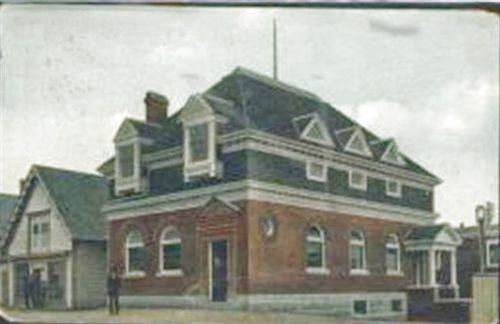 Front and side facades, Barrington Municipal Library, Barrington Passage, NS, ca. 1910. At this time, the building was known as the Union Bank of Halifax.; Courtesy of the Cape Sable Historical Society, Barrington Nova Scotia
