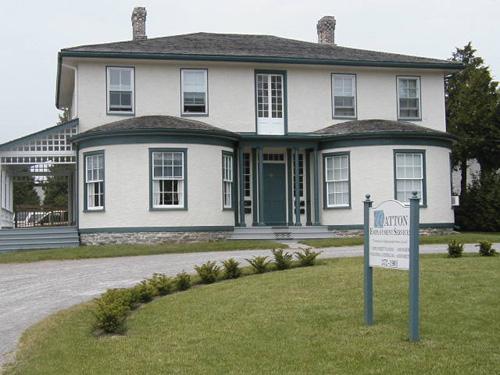 View of the south façade showing scale and proportions of centre block and bow windows – c. 2004; watton.ca, 2005