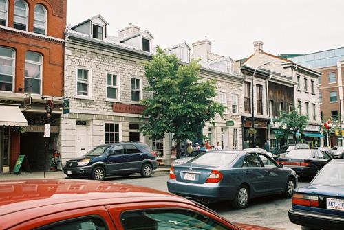 View of façade at 346-352 King Street showing proportions and limestone composition – July 2004; OHT, 2004
