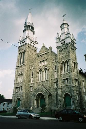 View of the main (north) façade of St. Brigid's Church showing the two towers – 2004; OHT, 2004