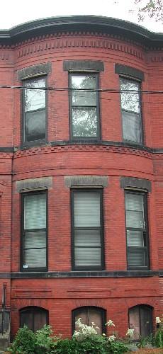This image provides a view of the curved two-storey bay windows, 2005.; City of Saint John