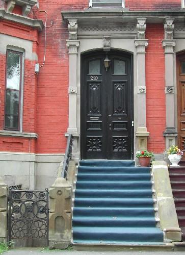This image portrays a view of the segmented arched entrance, 2005.; City of Saint John