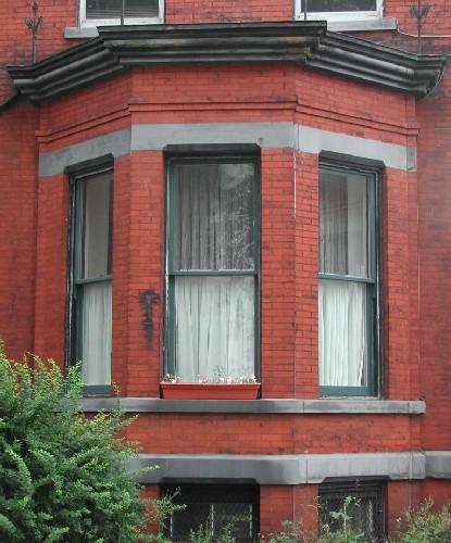 This image shows the single-storey bay window, 2005.; City of Saint John