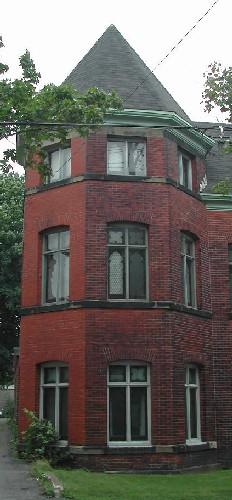 This image portrays the three-storey tower on the north end of the front facade, 2005.; City of Saint John