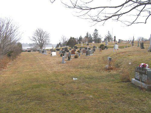 A view to the east down one of the avenues in Chebogue Cemetery, Rockville, Yarmouth County, 2008.; Heritage Division, NS Dept. of Tourism, Culture and Heritage, 2008