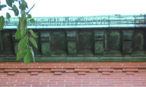 This image provides a view of the cornice supported by wooden brackets, 2005. ; City of Saint John
