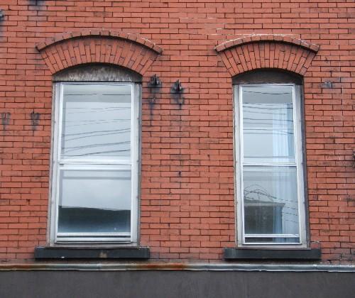 This image provides a view of the segmented arched windows, 2005.; City of Saint John
