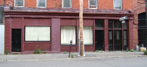 This image provides a view of the storefront of the front façade, 2005.; City of Saint John