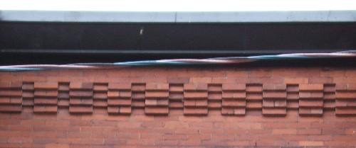This image provides a view of the cornice ornamented with brick corbel bands, 2005.; City of Saint John
