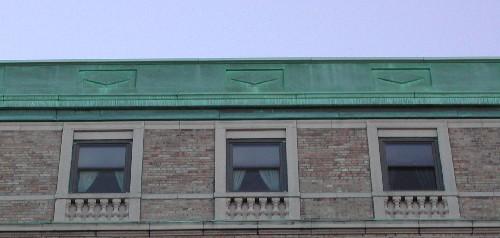 This image provides a view of the parapet above cornice and attic storey windows, 2005.
; City of Saint John