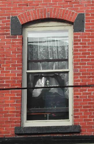 This image provides a view of a segmented arched window, 2005.

; City of Saint John