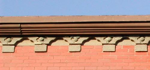This photo shows the cornice with sandstone brackets, 2005.; City of Saint John