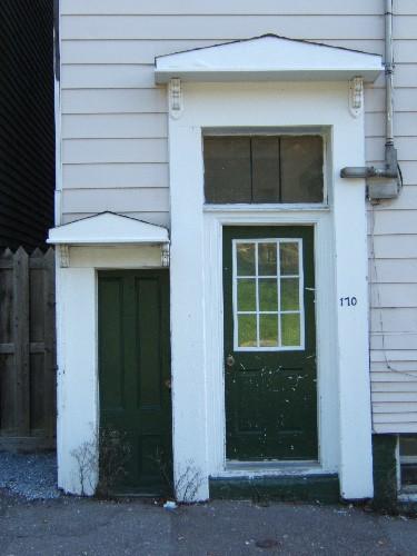 This photograph shows the main entrance to the building, 2005.; City of Saint John