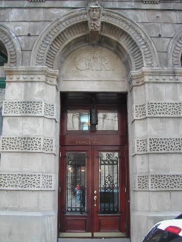 This photograph shows the main entrance to the building, 2005.; City of Saint John
