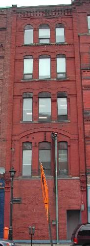 This photograph shows the Water Street façade, 2005.; City of Saint John