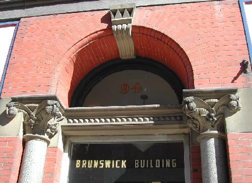 This photograph shows the Roman arch over columns with Corinthian at the entrance, 2005.; City of Saint John