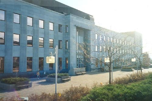 View of the Federal Building in Sherbrooke, showing the monumentally-scaled, long façade, 1995.; Public Works and Government Services Canada / Travaux publics et Services gouvernementaux Canada, 1995.