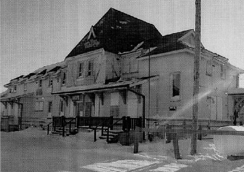 Front façade of the station, showcasing the station's Queen Anne Revival and Arts and Crafts styles and good quality materials and craftsmanship, 1999.; Agence Parcs Canada / Parks Canada Agency, 1999.