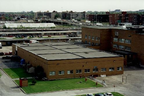 Aerial view of the National Film Board, 1998.; Public Works and Government Services Canada / Travaux publics et Services gouvernementaux Canada, 1998.