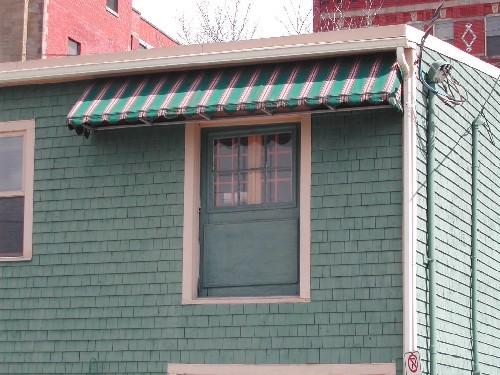 This photograph shows the old shipping/receiving dock in the upper storey, 2005.; City of Saint John