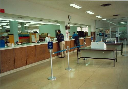 Interior view of the Vernon Federal Building, showing the postal lobby and the lock box lobby, 1994.; Parks Canada Agency / Agence Parcs Canada, 1994.