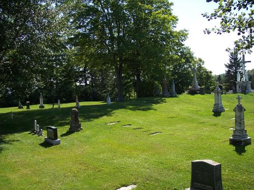 A photo of some of the tombstones of the Assomption Cemetery; The Valley District Planning Commision