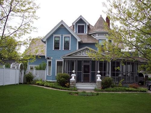 This image shows a view of the front façade of the house; The Valley District Planning Commision