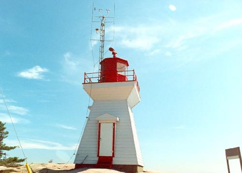 View of the entrance to the Tower, showing the detailing around, 1990.; Canadian Coast Guard / Garde côtière canadienne, 1990.
