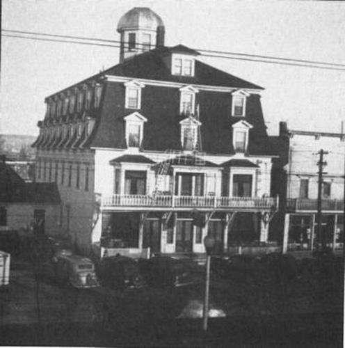 A historic image of the front façade of The Broadway, formerly the Grand Falls Hotel; Archives of the Religious Hospitallers