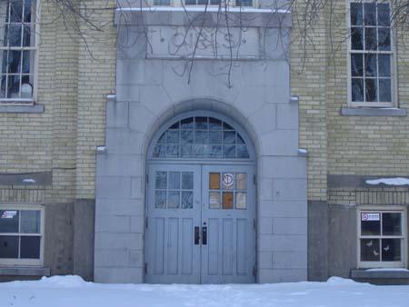 Historic “Girls” entryway on the rear, or east elevation of Elizabeth Ziegler Public School, 2007.; Kayla Jonas, 2007