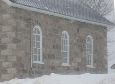 Detailed view of the west elevation depicting the 6/6 panes with semi-circular upper sections, 2007.; Kayla Jonas, 2007.