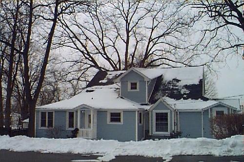 Front view of the Buchner House in winter; City of Niagara Falls, date unknown
